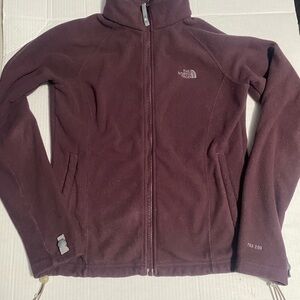 The North Face Purple Ski Jacket with Fleece Material and High Collar